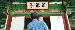A man and his baby visit Seoul after getting rewards from his excellent credit