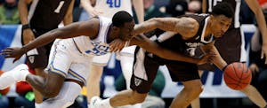 Basketball players battle in First Four round of March Madness