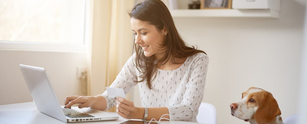 Young Caucasian businesswoman doing an online payment