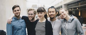 Group of friends thinking about why there are so many credit scores
