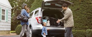 grange-car-insurance-review Family packing up a car